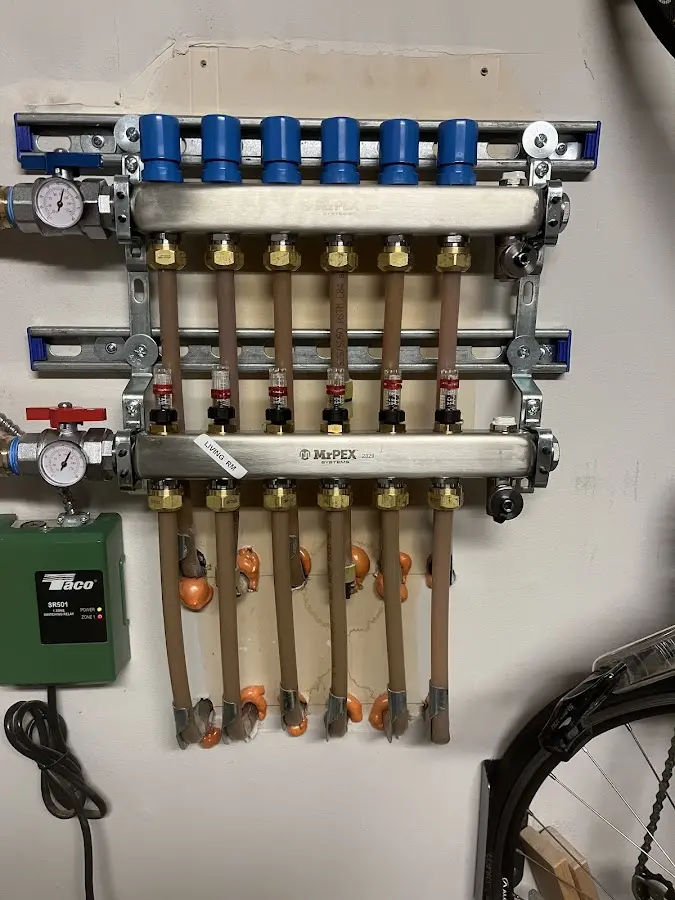 Plumber performing Water Heater Repair at a residential property in Mauldin